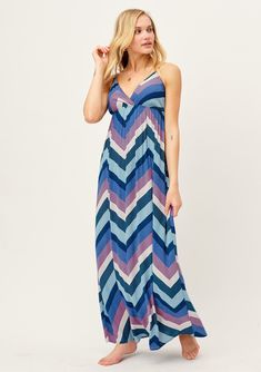 Our maxi dress demands attention with cool-toned slimming chevron stripes, perfect for beach days! Featuring a flattering v-neckline and empire waist, this warm weather dress is both elegant and comfortable. The flowy skirt adds a breezy quality to this perfectly cute Summer boho dress! FINAL SALE Sleeveless Maxi length Adjustable spaghetti straps Model is 5'10, wearing a size S.Style: I-71728W-QXE Flattering Maxi Dress, Comfortable Maxi Dresses, Gauze Maxi Dress, Coral Maxi Dresses, Paisley Maxi Dress, Burnt Orange Dress, Denim Maxi Dress, Blue Pink Purple, Tiered Ruffle Skirt