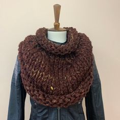 This beautiful, one-of-a-kind, hand-knitted poncho is made with 80/20 acrylic wool blend yarn in Sequoia Brown. It feels soft and comfortable and will keep you warm in the cold, winter days. Small - US 00-2 Medium - US 4-8 Large - US 10-12 Care instructions - Hand wash gently and lay flat to dry. Do not bleach. Do not iron. It is available in other colors (see the last photo) and can be made in many more upon request. 80% acrylic / 20% wool yarn All products are handmade by me in a smoke-free en Cozy Chunky Knit Wool Knitting Pattern, Winter Shawl Knitting Pattern One Size, Fall Knitting Pattern For Cold Weather In Acrylic, Oversized Hand Knitted Acrylic Knitting Pattern, Knit Fabrication Poncho For Fall, One Size, Fall Acrylic Knitting Pattern For Cold Weather, Knit Fabrication One-size Poncho For Fall, One Size Knit Poncho For Fall, Winter Knitted Shawl Pattern