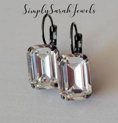 "♡ Genuine Austrian crystal rhinestones ♡ Color: Clear Crystal ♡ 14x10mm emerald cut (9/16\" x  3/8\")  ♡ Shiny Black Plated  ♡ Lever back setting ♡ 1\" long, 3/8\" wide ♡ Wedding, BlackTie" Cheap Black Crystal Pierced Earrings, Cheap Black Crystal Earrings, Wedding Black Tie, Wedding Black, Black Plates, Swarovski Crystal Earrings, Austrian Crystal, Emerald Cut, Black Tie