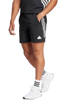 Bright 3-Stripes angle up the sides of sweat shorts made of cotton and recycled fibers with an easy-wearing fit that's perfect for any activity. 6 1/2" inseam; 23" leg opening; 12 1/2" front rise; 15 1/2" back rise (size Large) Elastic waist Front slant pockets 64% cotton, 36% recycled polyester Machine wash, dry flat Imported Cotton Activewear With Three Stripes For Sports Events, Sporty Three Stripes Athletic Shorts, Sporty Three-stripe Athletic Shorts, Sporty Athletic Shorts With Three Stripes, Sporty Shorts With Three Stripes For Sports, Athleisure Athletic Shorts With Three Stripes, Sporty Shorts With Three Stripes, Sports Shorts With Three Stripes, Three Stripes Sports Shorts