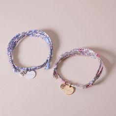 The A-Z of you and me. Build your own alphabet with our Personalized Mini Alphabet Liberty Bracelet by hand-engraving a treasured name or date onto the smooth pastille charm and adding up to 3 delicate letter charms to represent loved ones and little ones. Create a colourful gift by choosing a floral Liberty print to match a special personality18K Champagne Gold Plated and 925 Sterling SilverMini flat disc: 0.4 Diameter, 0.02 ThicknessMini alphabet charm: 0.2Liberty braid with fully adjustable s Adjustable Initials Charm Bracelet, Adjustable Initials Charm Bracelet For Mother's Day, Adjustable Initials Charm Bracelet For Everyday, Adjustable Name Bracelet With Charms For Everyday, Adjustable Friendship Name Bracelet With Charms, Adjustable Charms Name Bracelet For Everyday, Everyday Adjustable Charm Bracelet With Initials, Mother's Day Friendship Name Bracelet With Charms, Personalized Initials Charm Bracelet Adjustable