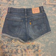 Levi's highwaist jean shorts waist 26" High-waisted Jean Shorts With Pockets, Medium Wash High-waisted Shorts, Short Jeans With Belt Loops, Retro High Waist Medium Wash Jean Shorts, Retro Jean Shorts With Pockets, Retro Short Denim Shorts, Medium Wash High-waisted Jean Shorts With Belt Loops, Medium Wash High-waisted Jean Shorts, Retro High Waist Jean Shorts With Built-in Shorts