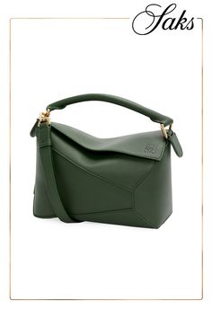 The LOEWE Puzzle Edge bag is a modern classic, beautifully crafted from Spanish leather. The unique, geometric design offers a fresh take on the traditional handbag silhouette. Top handle Removable shoulder strap Flap with zip closure Leather Lining: leather/cotton/linen Made in Spain SIZE About 9.36W x 6.435H x 4.095D Designer Structured Shoulder Bag, Designer Structured Satchel, Green Designer Shoulder Bag, Loewe Puzzle, Puzzle Bag, Modern Classic, Geometric Design, Cotton Linen, Top Handle