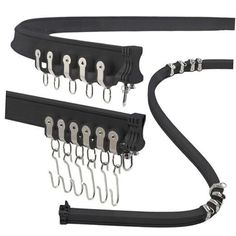 a set of black leather straps and hooks