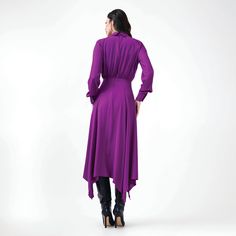 This Midi Dress comes with a stylish matching scarf, adding an extra layer of sophistication to the ensemble. The elegant midi length offers a flattering silhouette, while the scarf adds versatility and charm. Perfect for both casual and formal occasions, this dress brings together comfort and elegance for a refined, put-together look 60% viscose 40% polyester dry clean only Elegant Purple Winter Dresses, Chic Purple Midi Dress For Winter, Chic Purple Winter Midi Dress, Elegant Long Sleeve Asymmetrical Dress For Work, Elegant Asymmetrical Evening Dress For Fall, Formal Maxi Dress With Asymmetrical Hem For Fall, Elegant Purple Midi Dress For Office, Elegant Fall Dress With Handkerchief Hem, Elegant Handkerchief Hem Fall Dress