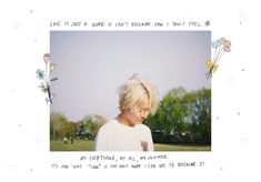 a woman with blonde hair standing in front of a white frame and flowers on it