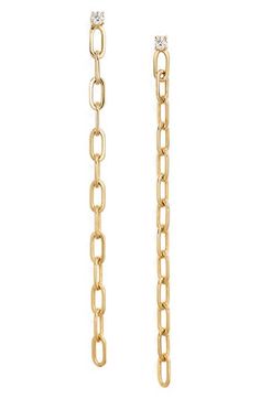 Set out to sparkle in these dainty 14-karat-gold drop chain earrings set with a faceted diamond stud. 1 3/4" drop, 1/8" width Post back Total diamond weight: 0.06ct. Color: G-H Clarity: SI1-SI2 14k gold/diamond Imported Diamond Chain, Diamond Stud, Chain Earrings, Diamond Studs, Earrings Set, Chain Link, Earring Set, Gold Diamond, Jewelry Earrings