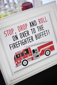 a sign that says stop drop and roll on over to the firefighter buffet