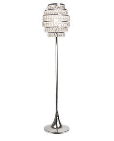 a chrome floor lamp with crystal balls on it