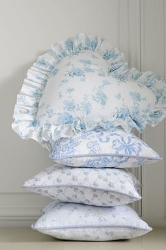 four pillows stacked on top of each other