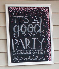 a chalkboard sign that says it's a good day to party and celebrate