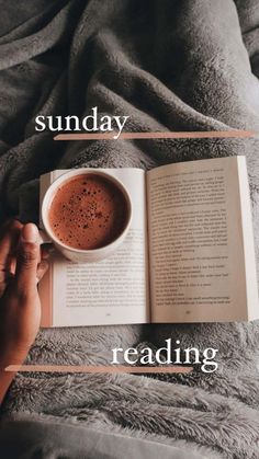 someone is reading a book and holding a cup of coffee in their hand with the text sunday reading