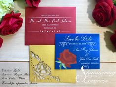 wedding stationery with red roses and blue envelopes