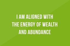 a green background with the words i am aligned with the energy of health and abundance