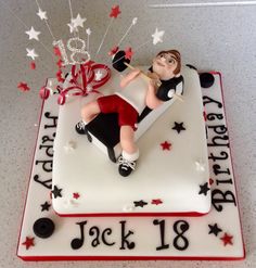 a birthday cake with a boy on it