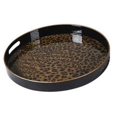 an animal print tray with black handles and gold trimmings on the bottom, is shown