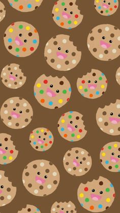 a brown background with lots of cookies and sprinkles