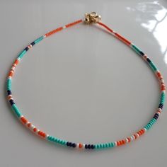 Bead Layer Boho Dainty Tiny Choker Necklace Jewelry - Etsy Bohemian Turquoise Beaded Necklace With Letter Beads, Turquoise Beaded Necklace With Tiny Beads, Green Beaded Strand Necklaces, Orange Heishi Beads Necklace, Bohemian Orange Beaded Necklace With Letter Beads, Turquoise Strand Beaded Necklace With Tiny Beads, Boho Layering, Jewelry Care Instructions, Beaded Choker Necklace