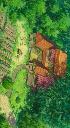 an aerial view of a house surrounded by trees