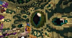 the interior of a minecraft house with lots of green and purple decorations on it