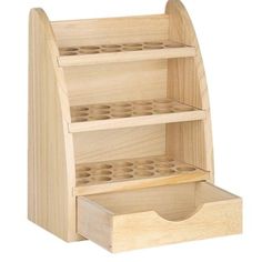 a wooden shelf with three compartments and one drawer