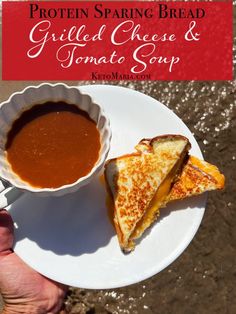 a person holding a plate with some food on it and the words, protein - based spring bread grilled cheese and tomato soup