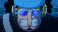 an anime character with big blue eyes wearing a helmet