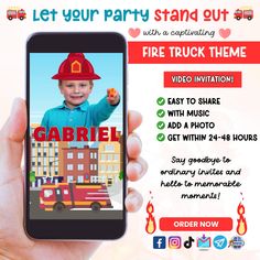 a person holding up a cell phone with a fire truck theme on the screen and an ad for gabril