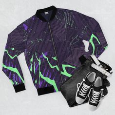 "Men's Bomber cyberpunk jacket, zip up jacket, futuristic jacket, cyberpunk art, psychedelic jacket glitch abstract green purple black colorful Looking fashionable has never been easier with this men's all-over print jacket with ribbed stand-up collar, elastic cuffs, and elasticized hem. Featuring the classic bomber jacket look, a durable zipper and two pouch pockets, this jacket is ready to take your everyday look a notch higher to reflect your unique personality and style. * 100% Polyester - This extremely strong and durable synthetic fabric retains its shape and resists wind, sun and rain * Full front zipper closure * Two lined welt pockets at front - Self lined slanted pockets at the sides * Dark blue polyester lining * All over print - Print covers the entire jacket * Rib Knit - The j Cyberpunk Fitted Outerwear For Streetwear, Rave Style Black Winter Outerwear, Black Rave Outerwear For Winter, Fitted Techwear Track Jacket For Streetwear, Fitted Purple Outerwear For Streetwear, Fitted Graffiti Print Outerwear For Streetwear, Fitted Green Track Jacket For Streetwear, Green And Purple Outfit, Jacket Cyberpunk