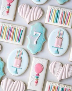 decorated birthday cookies arranged on top of each other