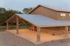 an image of a large garage in the middle of a field