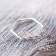 Minimalist Silver Diamond-shaped Jewelry, Minimalist Faceted Stackable Rings, Minimalist Silver Stackable Rings With Diamond Cut, Minimalist Octagon Jewelry For Everyday, Minimalist Everyday Octagon Jewelry, Minimalist Hexagon Faceted Jewelry, Minimalist Octagon Ring For Gift, Diamond-shaped Sterling Silver Rings, Silver Geometric Ring Gift