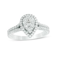 a pear shaped diamond ring on a white background