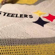 a blanket with the name steelers written on it