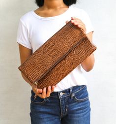 Please read our shipping terms and conditions before placing an order : https://www.etsy.com/listing/1079992551/must-read-alus-indonesia-shipping-terms Get your christmas gift early with our discounted animal print clutches made of genuine calf hair leather. Perfect case for your ipad standard, or simply to carry essential items such as phone, mask and lip stick. Listed is genuine leather clutch with embossed croco pattern to add high end style to your look. SPECIFICATIONS ♥ Photo shown is size Phone Mask, Fold Over Clutch, Classic Brown, Fold Over, Leather Clutch, Embossed Leather, Evening Bags, Clutches, Animal Print