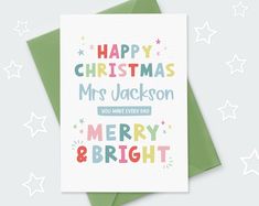 a christmas card with the words merry and bright written in multicolored letters on it