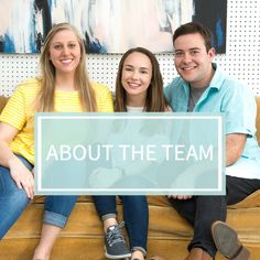 three people sitting on a couch with a sign that says about the team in front of them