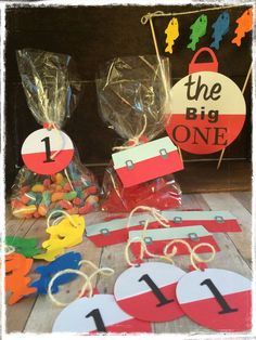 some candy bags and tags on a table