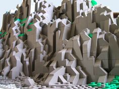 an artistic sculpture made out of lego blocks