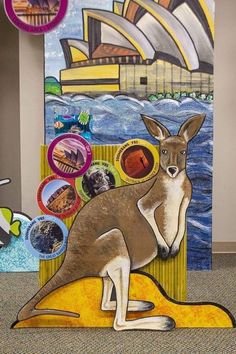 a painting of a kangaroo in front of the sydney opera house with other images on it