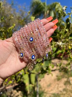 Milky pink beaded bracelet with an evil eye charm for protection ✨ Virgencita Bracelet, Mystical Accessories, Bracelets Outfit, Girly Bracelets, Gifts Best Friend, Pink Beaded Bracelets, Milky Pink, Crystal Bead Jewelry, Chakra Beads