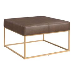 a brown ottoman sitting on top of a metal frame