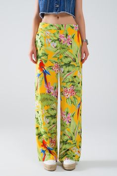 Length: Full length. Subcategory: Pants. Fit: Relaxed fit. Leg: Wide leg. Style: Party. Fabric: Lightweight woven fabric . Zipper: Zip side. runs true to size. S. 100% Polyester LINING 100% Polyester Tropical Long Pants For Spring, Tropical Bottoms With Elastic Waistband, Tropical Long Pants With Elastic Waistband, Fitted Tropical Bottoms For Spring, Tropical Wide Leg Green Pants, Tropical Wide-leg Pants For Spring, Fitted Multicolor Tropical Print Bottoms, Multicolor Tropical Print Summer Pants, Yellow Floral Print Long Pants