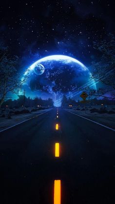 an empty road with the moon in the sky and trees on either side at night