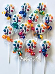 there are many lollipops with different designs on them