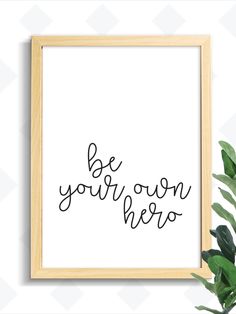 a black and white print with the words be your own hero in cursive font