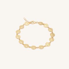 Channel your inner greek goddess with our shiny coin bracelet. Easy to dress up or down, pair this piece with a flowy white dress and strappy sandals, or with a white button up and blue jeans for a casual look. This beauty pairs well with any simple gold layering chains or bead bracelets. 14k Gold Vermeil Hypoallergenic Dimensions: 6" + 1" extender (7" total) Layering Chains, Flowy White Dress, White Flowy Dress, Bracelet Easy, Coin Bracelet, White Button Up, Bead Bracelets, Greek Goddess, Dream Jewelry