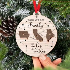 a christmas ornament that says, when you are family we don't matter