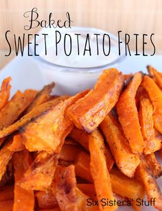 baked sweet potato fries on a white plate