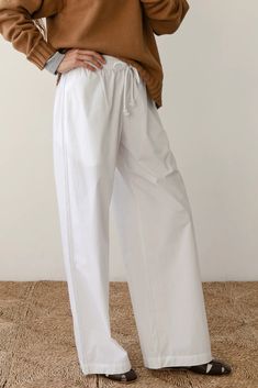 The Pop Pant Spring Solid Wide Leg Pants With Drawstring, Spring Solid Color Wide Leg Pants With Drawstring, Cotton Wide Leg Parachute Pants For Loungewear, White Wide Leg Parachute Pants With Drawstring, Cotton Wide-leg Pants With Drawstring, Cotton Wide Leg Pants With Elastic Waistband For Daywear, Wide Leg Cotton Bottoms For Daywear, Cotton Relaxed Fit Pants With Drawstring, Spring Cotton Wide-leg Parachute Pants